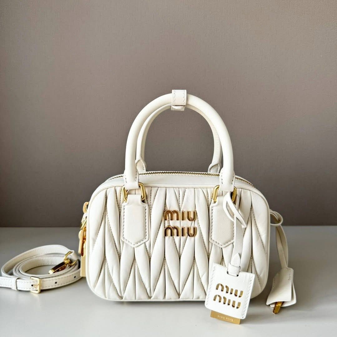 Arcadie Matelassé Nappa Leather Bag (Category: Luxury Bags & Wallets) located in Manila. Submitted by bagsandmanymanymore1 (Listing ID 1469433014, Image 1). Description: Miu Matelassé Leather Bag Leather handles Removable leather mirror case Gold tone hardware With purse feet Zipper closure What you see is what you get.