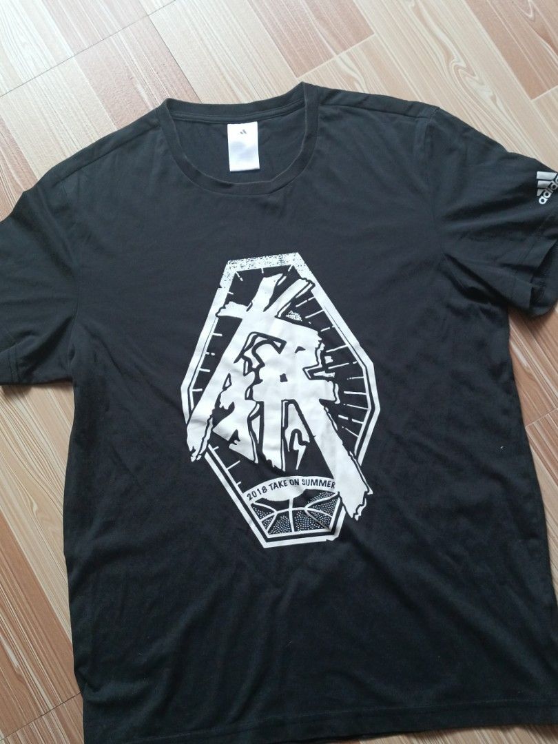ASPACK 3 shirts (Category: Tshirts & Polo Shirts ) located in Imus. Submitted by boosterph691 (Listing ID 1469426875, Image 2). Description: - Color: Black with large white graphic print - Design: 'Smoking Kills' text box over Saint Laurent style YSL branding - Details: Small embroidered rabbit logo patch near the hem and unique yellow neck tag - Fit: Normal fit, classic crew neck - Material: Comfortable, breathable cotton - Style: Great streetwe
