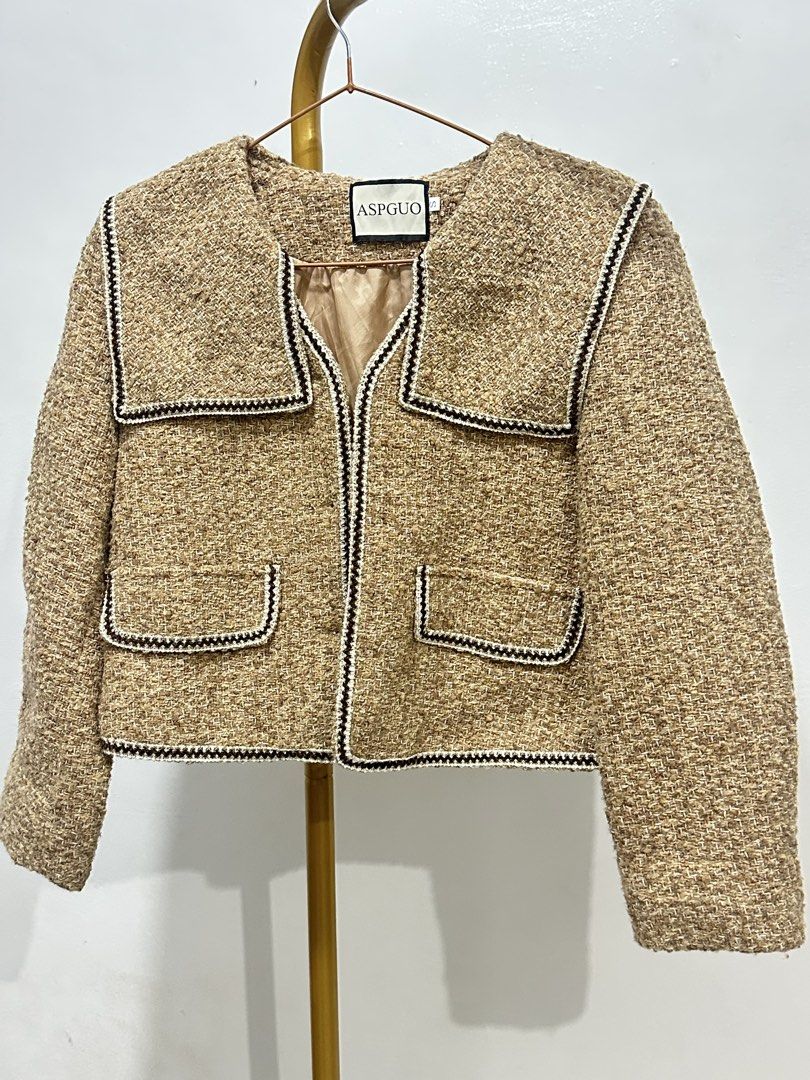ASPGUO Tweed Sailor Collar Cropped Jacket (Category: Coats, Jackets and Outerwear) located in Pasig City. Submitted by Tatsiel (Listing ID 1469397952, Image 1). Description: - Brand/Style: ASPGUO textured tweed cropped jacket - Color: Warm tan with brown and white contrast trim - Design: Sailor collar and button-front closure - Features: Functional front pockets and fully lined interior - Fit: Cropped length, pairs perfectly with high-waisted bot