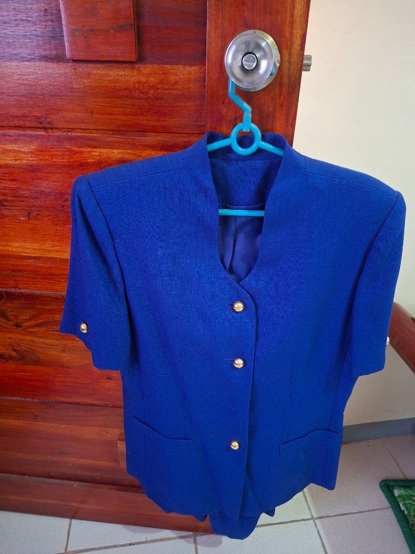 Royal Blue Blazer with Gold Buttons (Category: Coats, Jackets and Outerwear) located in Bulacan. Submitted by rafaesarisari (Listing ID 1469422752, Image 1). Description: - Color: Bright royal blue - Sleeves: Short sleeves with matching gold buttons on cuffs - Fit: Structured fit - Closure: Round gold-toned buttons down the front - Details: Decorative front pockets - Lining: Fully lined with darker blue fabric - below the knee skirt NO ISSUE. DEC