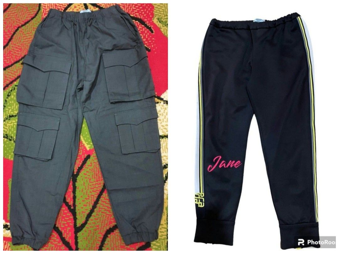 Authentic💯2pcs Prada Black Cargo Pants (Category: Luxury Apparel) located in Tagum. Submitted by maryjanepradalux (Listing ID 1469551339, Image 1). Description: - Brand: Prada (Made in Romania) - Size: 40S - Color: Black with white and yellow side stripes - Design: Multi-pocket cargo styling with zippered ankle cuffs - Details: Elastic waistband with interior Prada Milano tags - Fit: Comfortable custom streetwear piece Pm for more details .