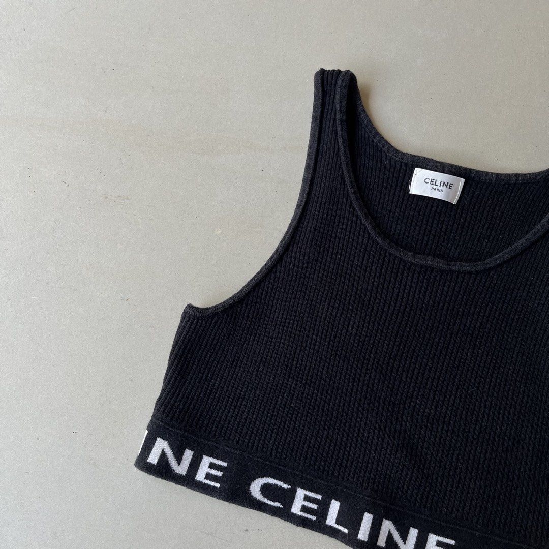 Authentic Celine Ribbed Wool Crop Top Black White Logo (Category: Shirts) located in Mandaue City. Submitted by chinsyap_03 (Listing ID 1469465975, Image 2). Description: - Brand: Celine - Style: Ribbed knit crop top with scoop neckline and racerback - Color: Black with contrast white Celine branding around the hem - Material: 100% wool, made in Italy - Condition/Details: Interior tag and care label intact - Size: Measures 13 x 13 inches (fits sm