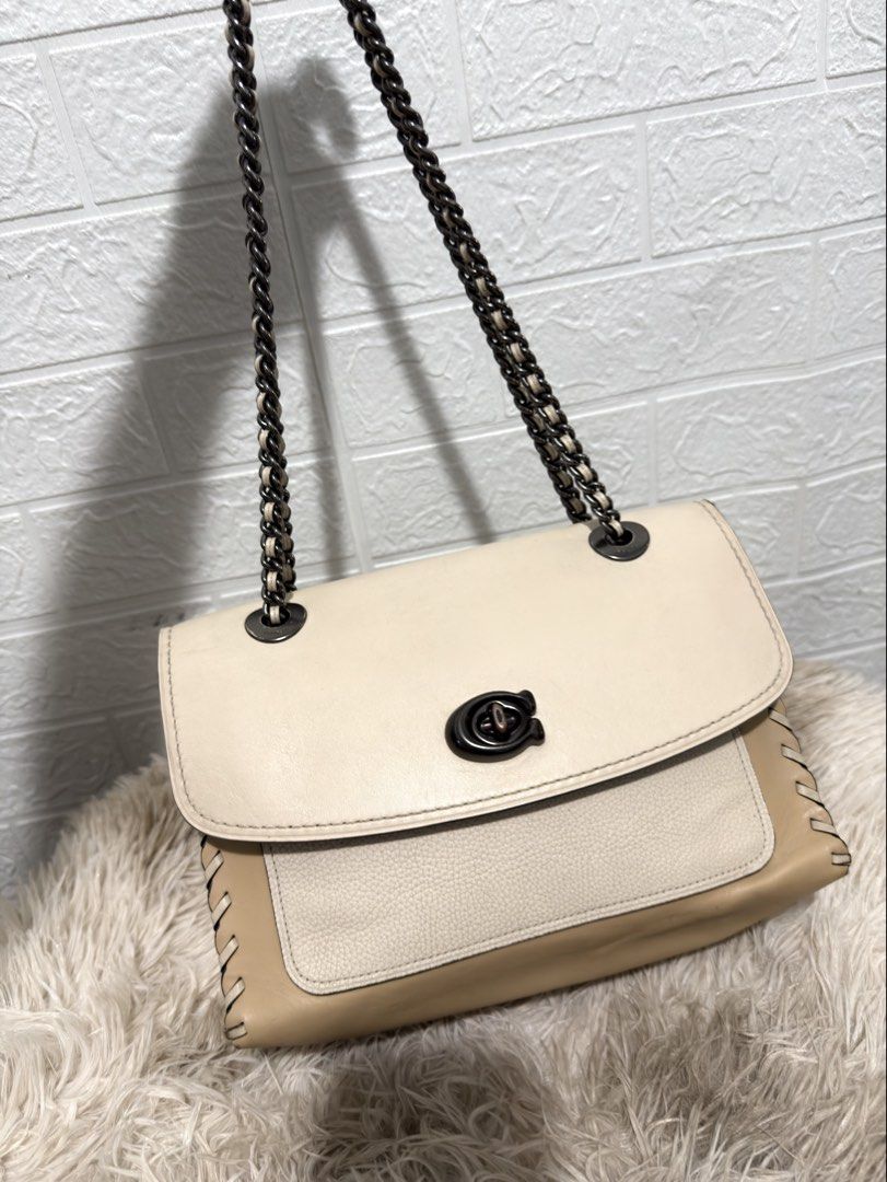 💯AUTHENTIC COACH PARKER WITH WHIPSTITCH (Category: Luxury Bags & Wallets) located in Daraga. Submitted by jasmor (Listing ID 1469404424, Image 2). Description: 💯AUTHENTIC 🎀2 way; can be sling/shoulder 🎀made in Vietnam; ykk underzip 🎀velvety suede micro-fiber interior 💢flaw: peeling on interior creed ✔️onhand 📦J&T courier.