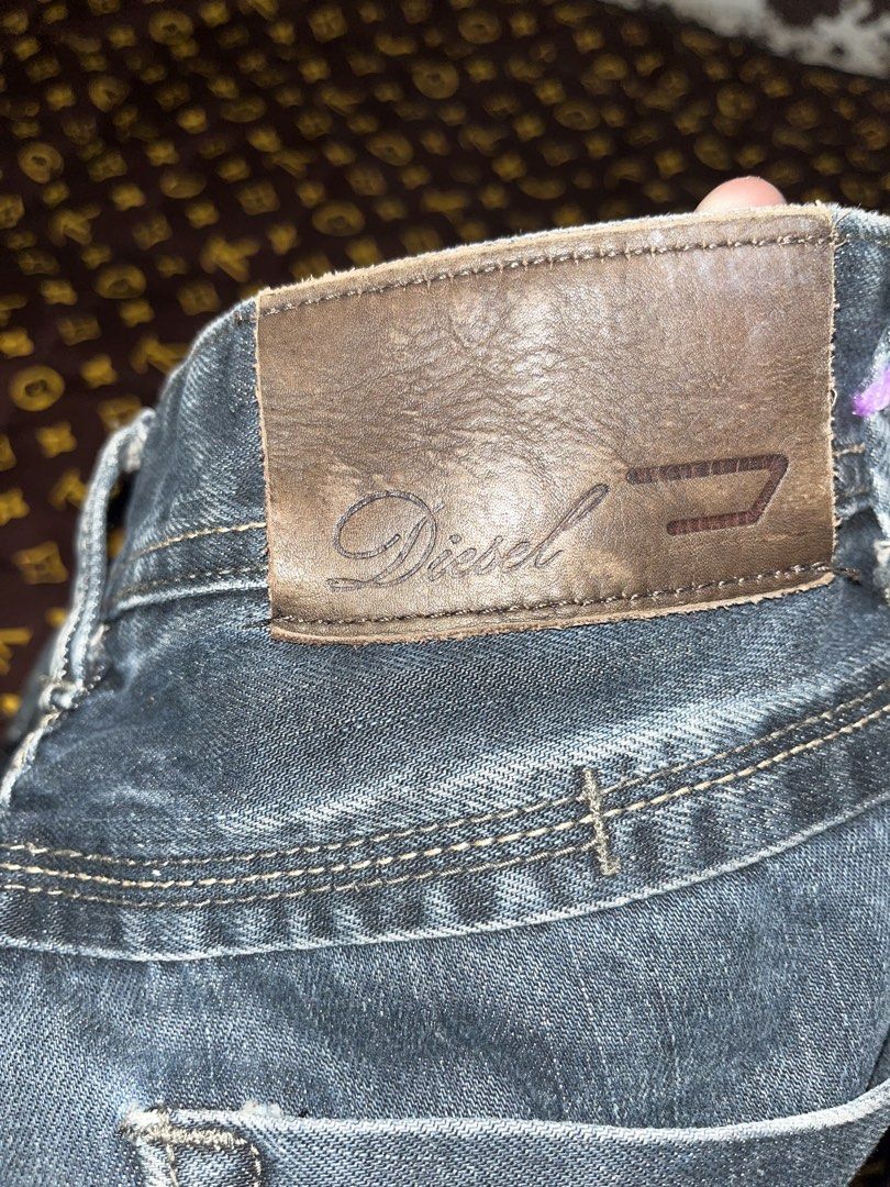 AUTHENTIC DIESEL DENIM JEANS (Category: Jeans) located in Manila. Submitted by becarria_thrift23 (Listing ID 1469483643, Image 1). Description: Upgrade your denim collection with these iconic, high-quality Diesel jeans! Designed with custom back pocket stitching, branded hardware, and a classic faded wash. Made in Italy! Brand: Diesel JPG + 1 Size: 28 JPG + 1 Color: Medium Vintage Wash Blue JPG + 2 Condition: Excellent Pre-owned / Great Vintage C