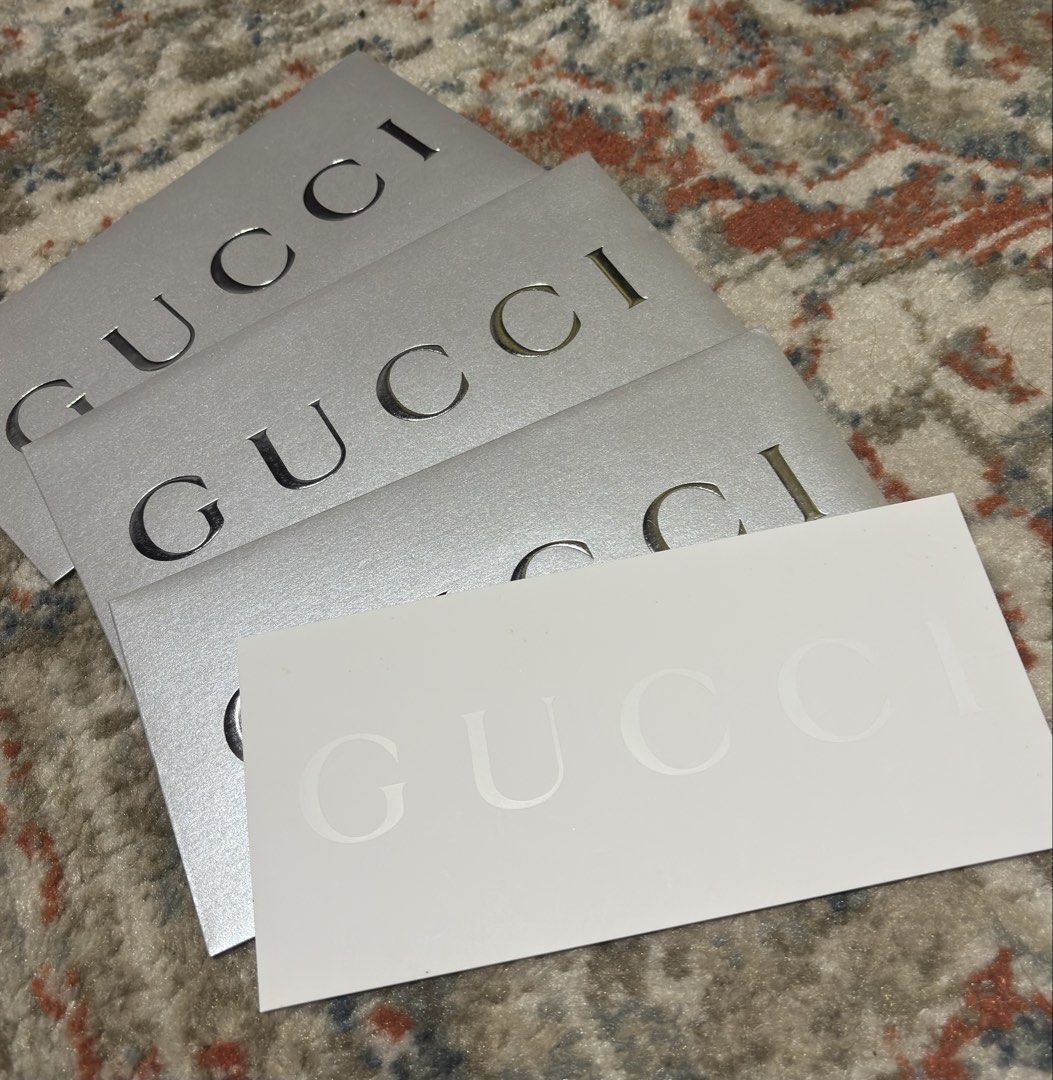 Authentic Gucci Silver Envelope with Card and Adhesive (Category: Luxury Bags & Wallets) located in Manila. Submitted by nikashoppe (Listing ID 1469526092, Image 1). Description: Gucci silver envelopes with embossed branding (350 ea) - Comes with 1 white card featuring the matching Gucci logo - Ideal for gifting, collection, or enhancing item presentation.