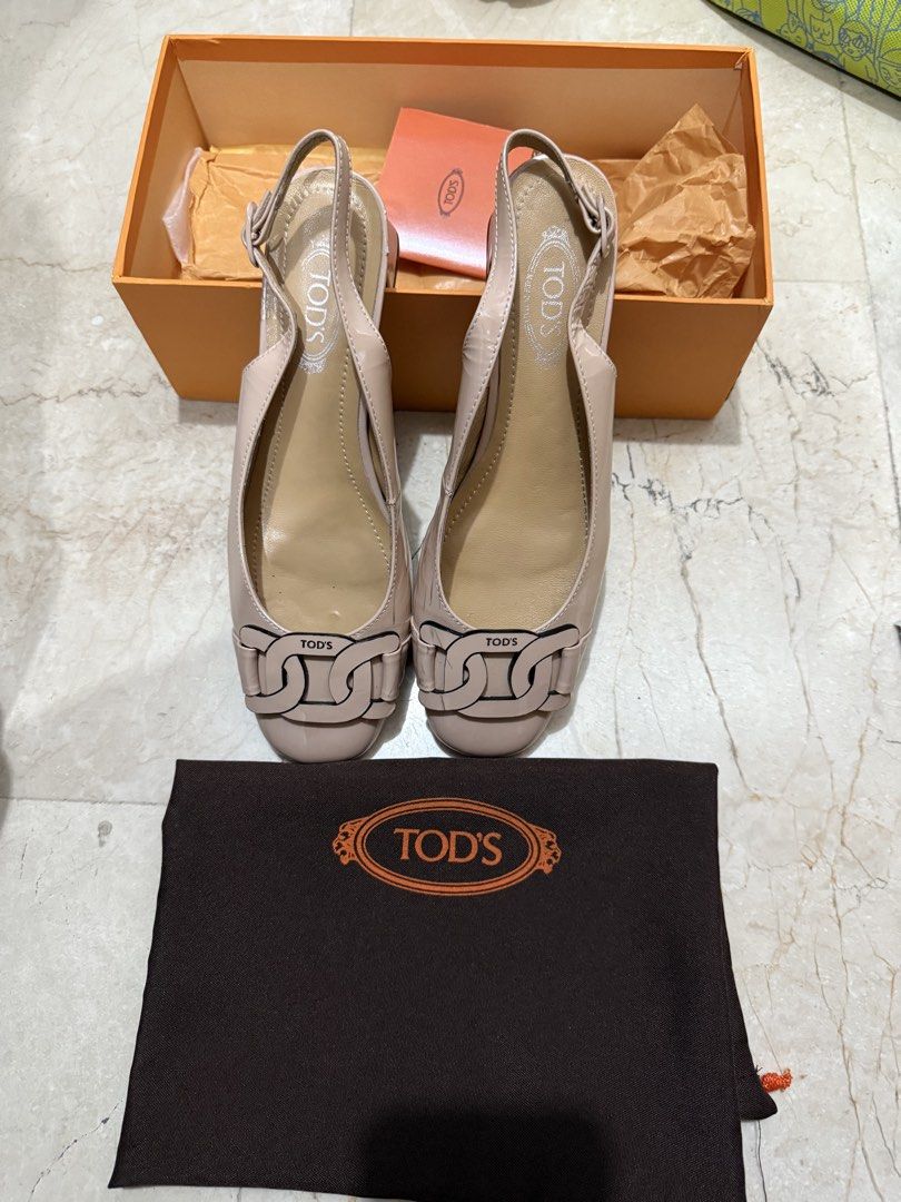 Authentic Tods block heels (Category: Heels) located in Manila. Submitted by echipmunk (Listing ID 1469474854, Image 1). Description: Authentic Tods block heels Used once only Inclusion: Heels, 1 dustbag, card, box Size 38 - Fits US 7.5-8.