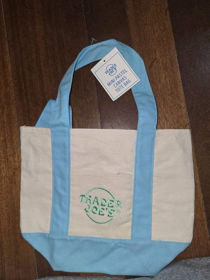 Authentic Trader Joe's Pastel Canvas Tote Bag (Category: Tote Bags) located in Lipa City. Submitted by shoplistaavenue (Listing ID 1469513536, Image 2). Description: Authentic Trader Joe's Mini Pastel Canvas Tote Bags Selling the highly sought-after, viral limited-edition Trader Joe's Mini Pastel Canvas Totes! These are authentic, completely brand new with tags and imported directly from the US. Perfect for quick errands, lunch bags, or a trendy 