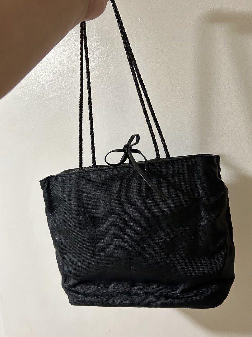 Authentic Versace Tote Bag (Category: Luxury Bags & Wallets) located in Tarlac. Submitted by ijiro_decluttering (Listing ID 1469567302, Image 3). Description: Very nice vintage Condition. Free shipping po. .