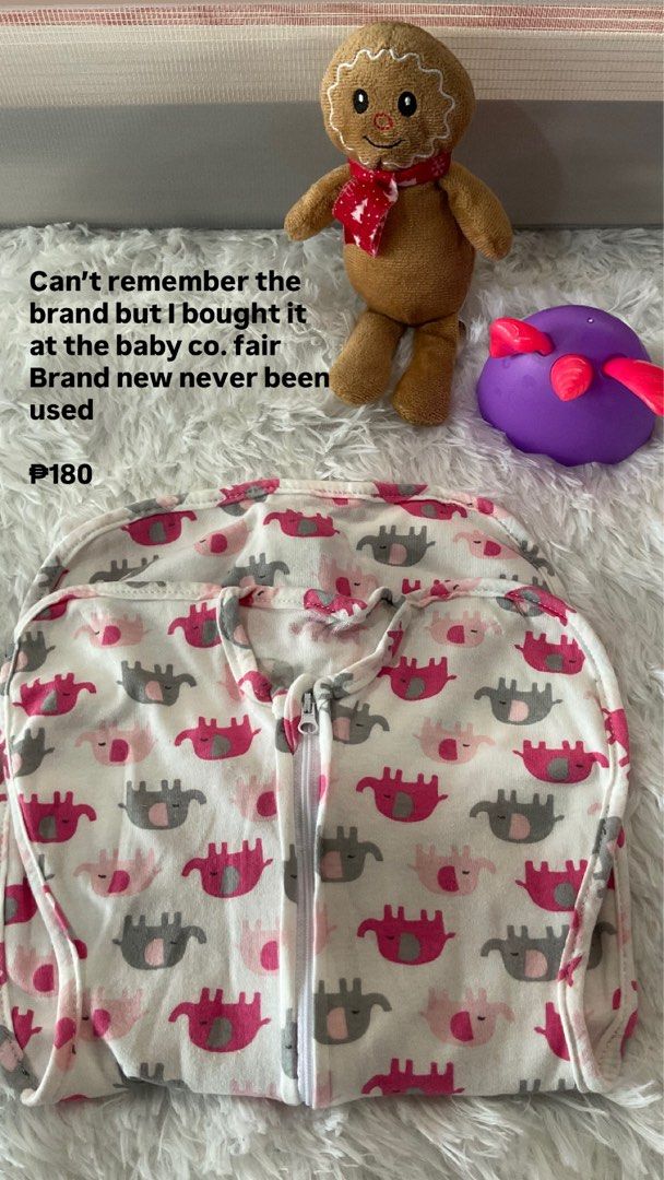 Baby Swaddle with Elephant Print (Category: Babies & Kids Fashion) located in Cainta. Submitted by linelle. (Listing ID 1469442164, Image 1). Description: - Brand new, never used, and cleanly stored - Bought from the Baby Co. fair - Super soft and gentle material perfect for little ones - Charming white fabric with an all-over pink and grey elephant pattern - Easy full-zip closure down the front for quick changes.