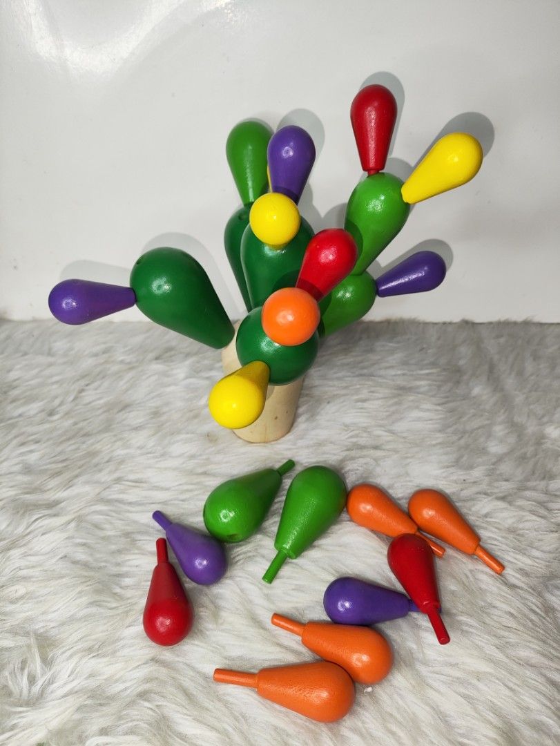 Balancing Cactus Wooden Game for Kids (Category: Educational & Learning Toys) located in Cavite. Submitted by tinetaclesss (Listing ID 1469553713, Image 2). Description: - Fun and engaging wooden balancing cactus game - Helps kids develop planning and imaginative abilities - Includes a sturdy wooden base and colorful cactus pieces in green, red, yellow, orange, and purple - .