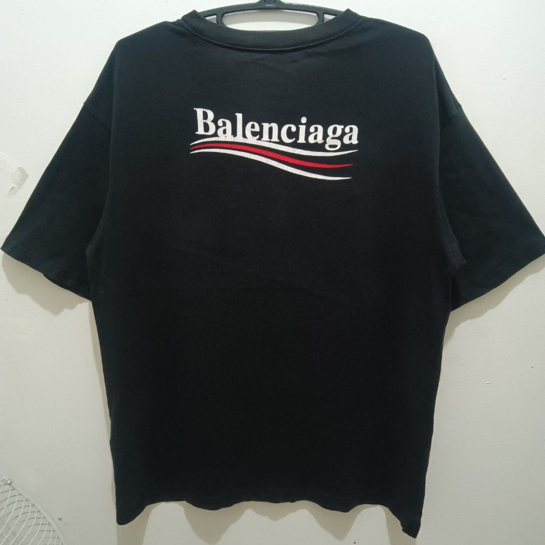 BALENCIAGA Black Shirt (Category: Tshirts & Polo Shirts ) located in Caloocan City. Submitted by jaychingsss (Listing ID 1469499321, Image 1). Description: Balenciaga Shirt - 250 23x28 Color Rate: 9.5/10 Complete Tags Minor issue: hairlines NEED WASH.