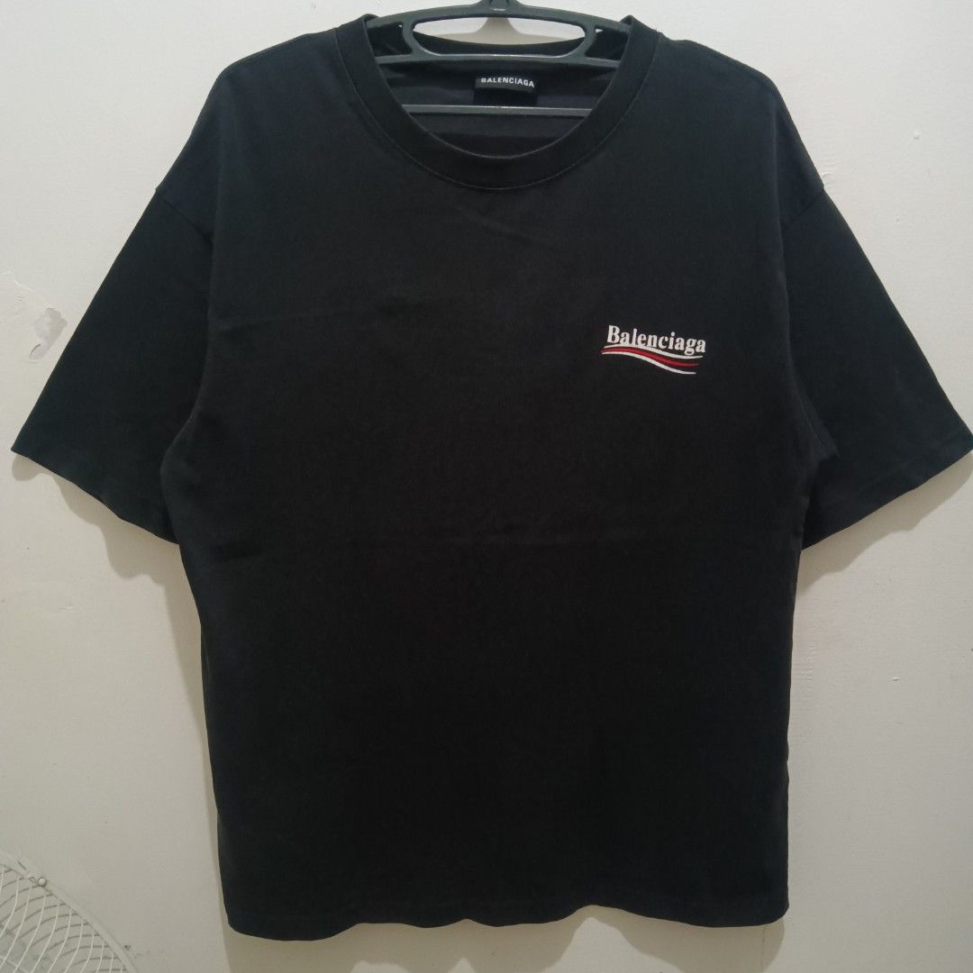 BALENCIAGA Black Shirt (Category: Tshirts & Polo Shirts ) located in Caloocan City. Submitted by jaychingsss (Listing ID 1469499321, Image 2). Description: Balenciaga Shirt - 250 23x28 Color Rate: 9.5/10 Complete Tags Minor issue: hairlines NEED WASH.