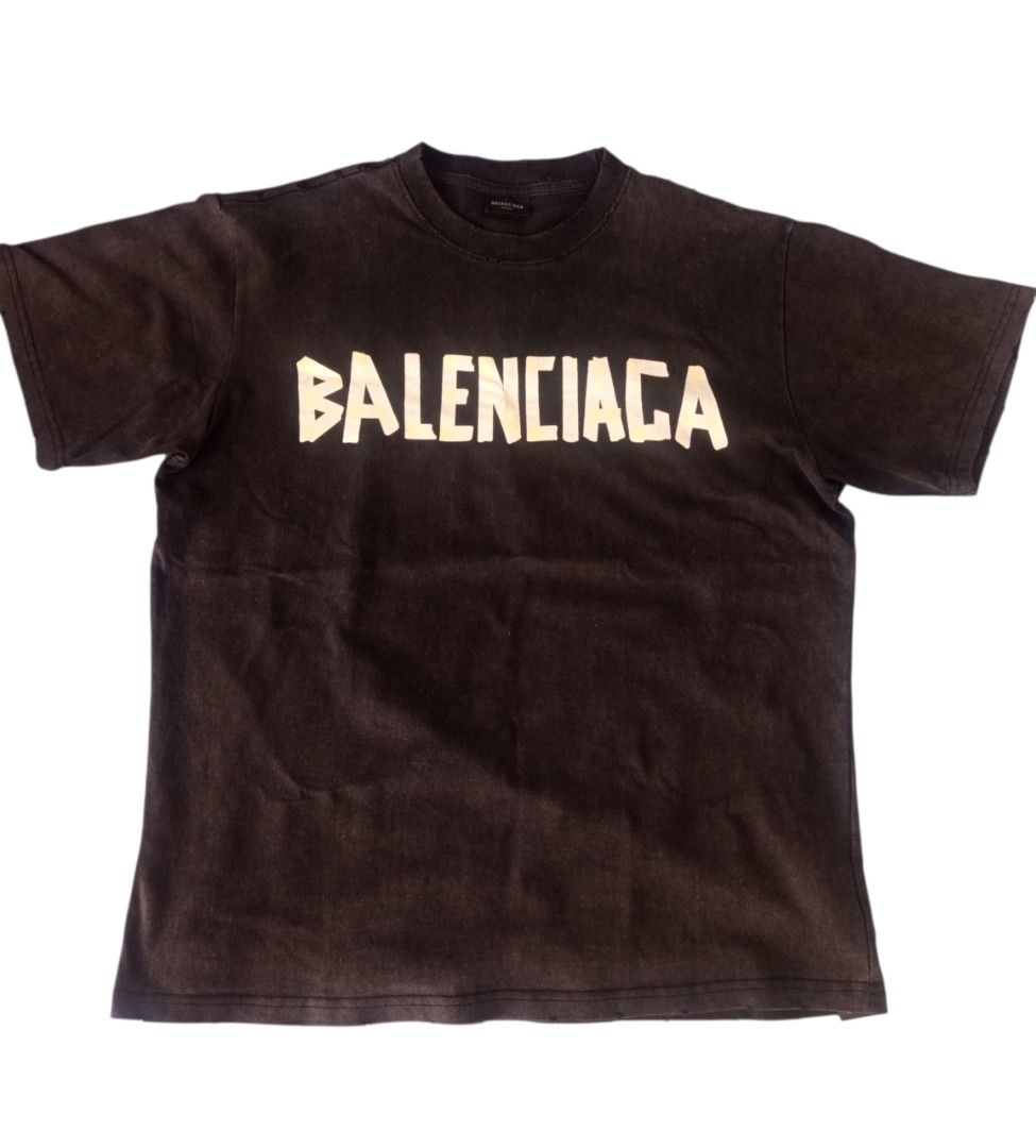 Balenciaga Tape Type Graphic Tee Black Size M (Category: Tshirts & Polo Shirts ) located in Manila. Submitted by aquarius92 (Listing ID 1469556684, Image 3). Description: BALENCIAGA Tape type Distressed Size On Tag M Good Condition Dimensions: L-29 W-24 👉 📩📩📩 .