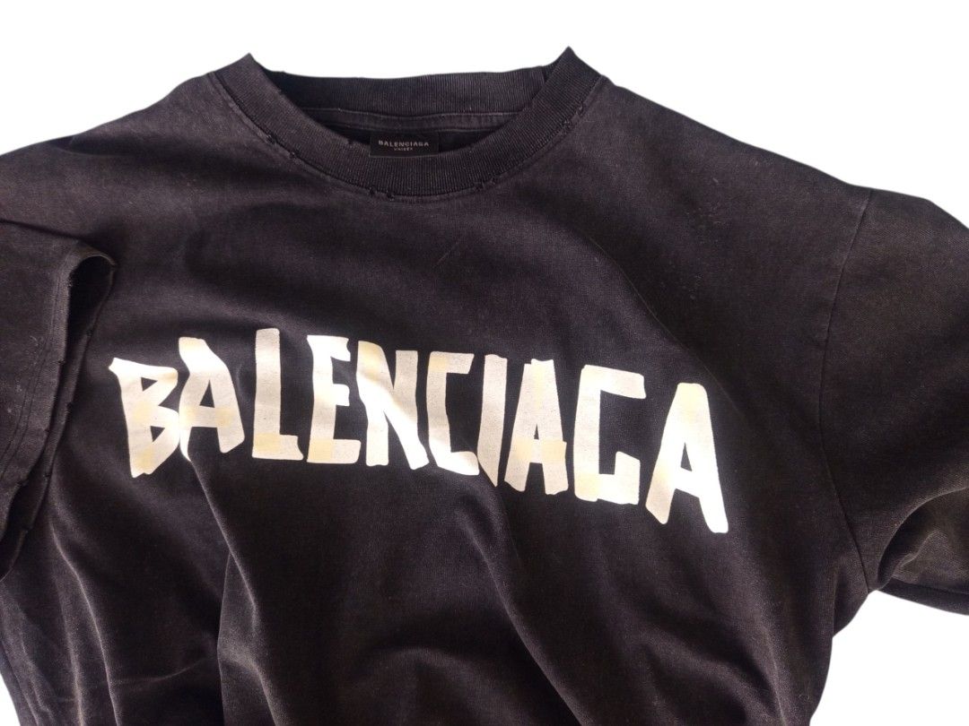 Balenciaga Tape Type Graphic Tee Black Size M (Category: Tshirts & Polo Shirts ) located in Manila. Submitted by aquarius92 (Listing ID 1469556684, Image 2). Description: BALENCIAGA Tape type Distressed Size On Tag M Good Condition Dimensions: L-29 W-24 👉 📩📩📩 .
