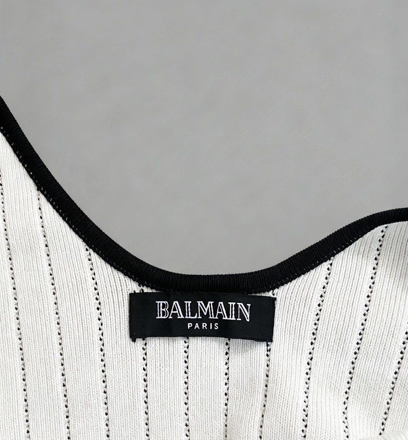 Balmain paris knitted sando (Category: Luxury Apparel) located in Manila. Submitted by 2ndmemoir (Listing ID 1469447305, Image 3). Description: Balmain paris No issue Excellent condition 9.8 colorate No flaws Good as new Need wash 12.5 width strechable 22.5 inches length .