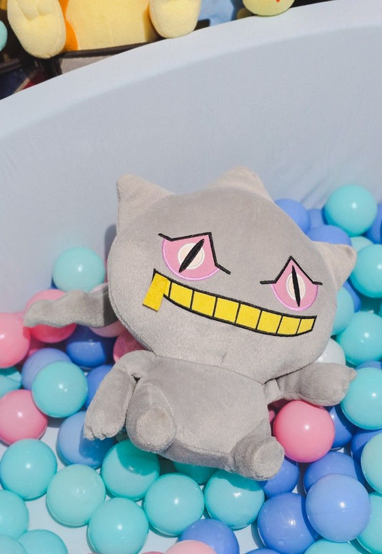 Banette Pokémon Plushie (Category: Plushies & Soft Toys) located in Paranaque City. Submitted by vanchris84 (Listing ID 1469530995, Image 2). Description: - Item: Banpresto Banette Pokémon Plush Toy - Condition: Clean, well-kept, and adult-owned from a collection - Design details: Pointy head, striking pink eyes, and yellow zippered mouth - Material: Soft, huggable fabric - Pose: Sitting pose - Ideal for: Pokémon trainers, plushie collectors, and