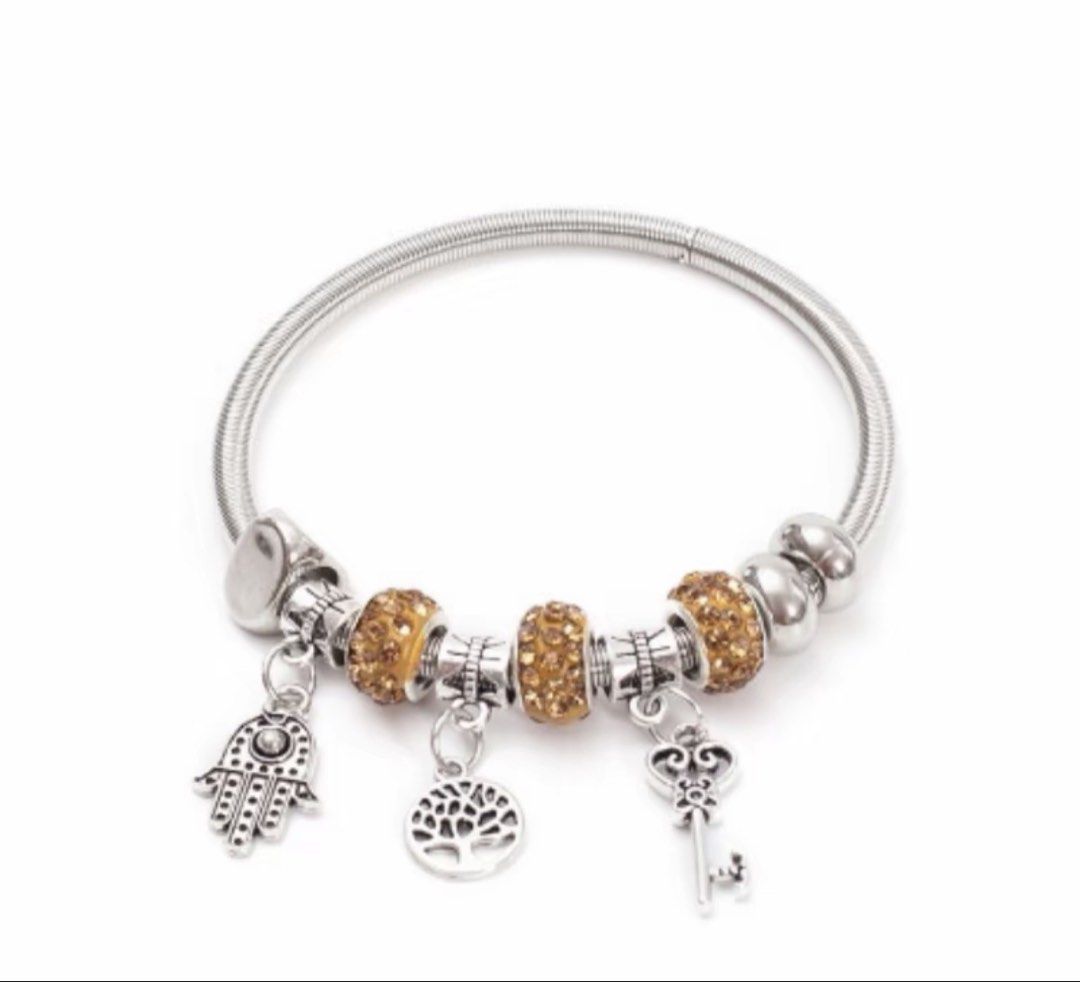 Bangle with charms non tarnish (Category: Bracelets) located in Manila. Submitted by vintageaccessories (Listing ID 1469497623, Image 3). Description: .