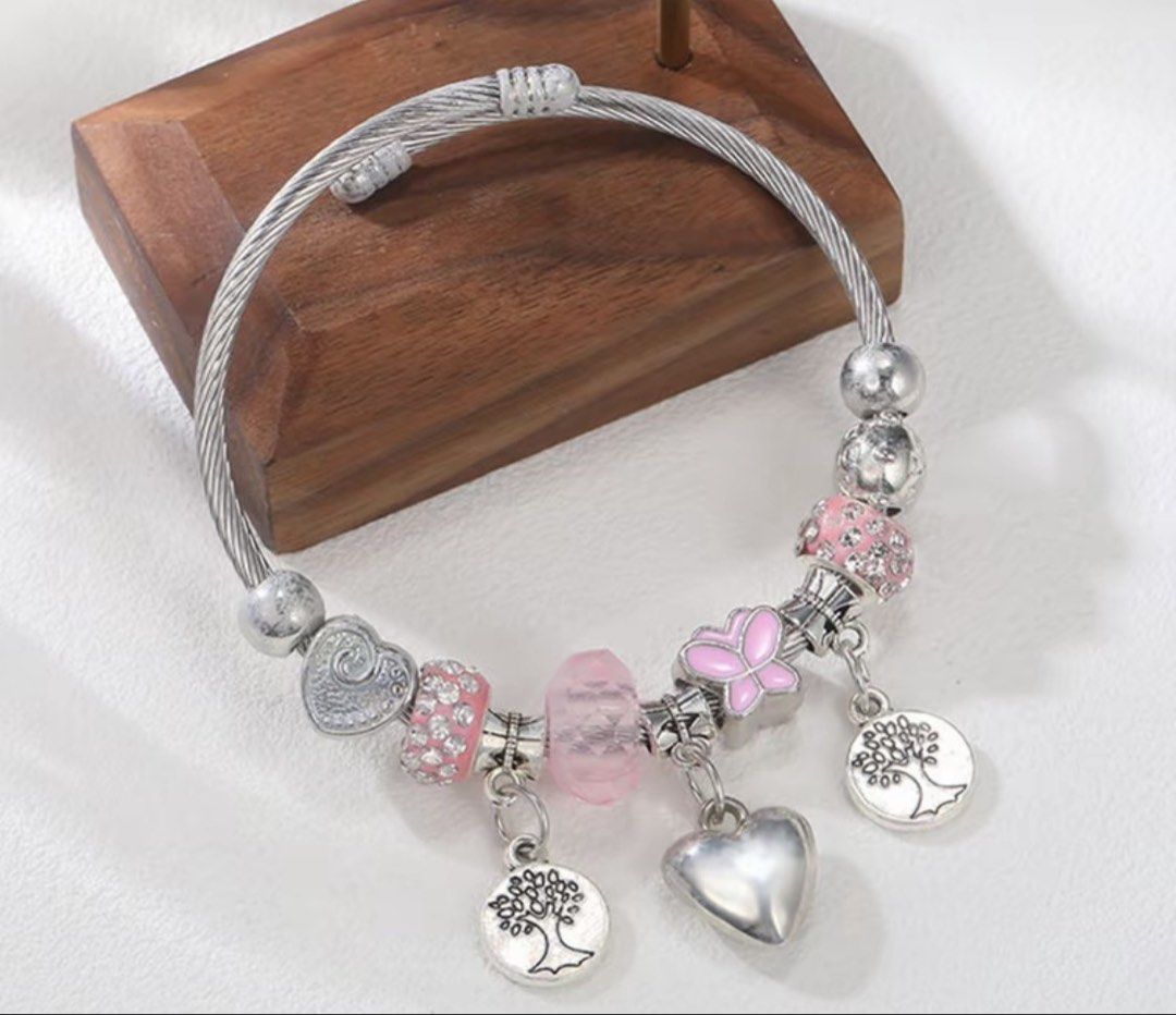 Bangle with charms non tarnish (Category: Bracelets) located in Manila. Submitted by vintageaccessories (Listing ID 1469497623, Image 1). Description: .