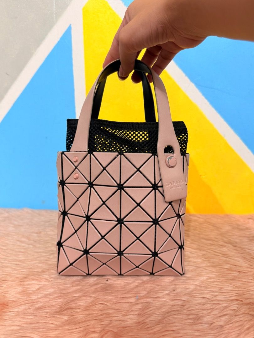 BaoBao Issey Miyake Japan (Category: Luxury Bags & Wallets) located in Cagayan de Oro. Submitted by rairaibags (Listing ID 1469506639, Image 1). Description: Made in Japan. Pastel Peach..