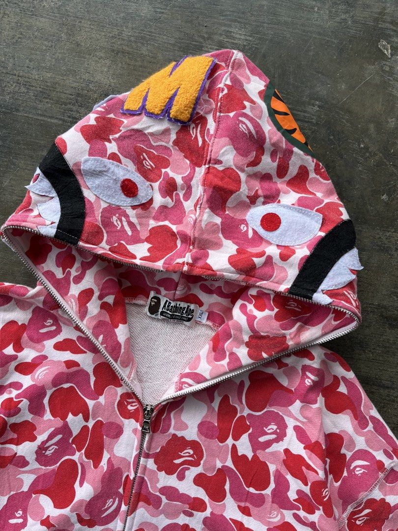 Bape Pink Camou Full Zip Hoodie (Category: Hoodies) located in Kalibo. Submitted by notdavaaa (Listing ID 1469500621, Image 2). Description: Dimes: W: 25 L: 29 Very good condition Issue: see last pic Color Rate: 9.5/10.