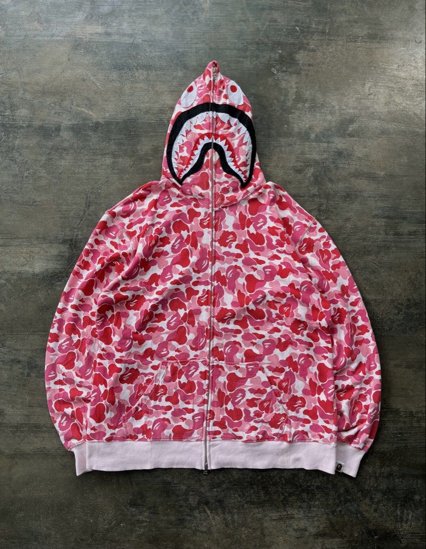 Bape Pink Camou Full Zip Hoodie (Category: Hoodies) located in Kalibo. Submitted by notdavaaa (Listing ID 1469500621, Image 1). Description: Dimes: W: 25 L: 29 Very good condition Issue: see last pic Color Rate: 9.5/10.