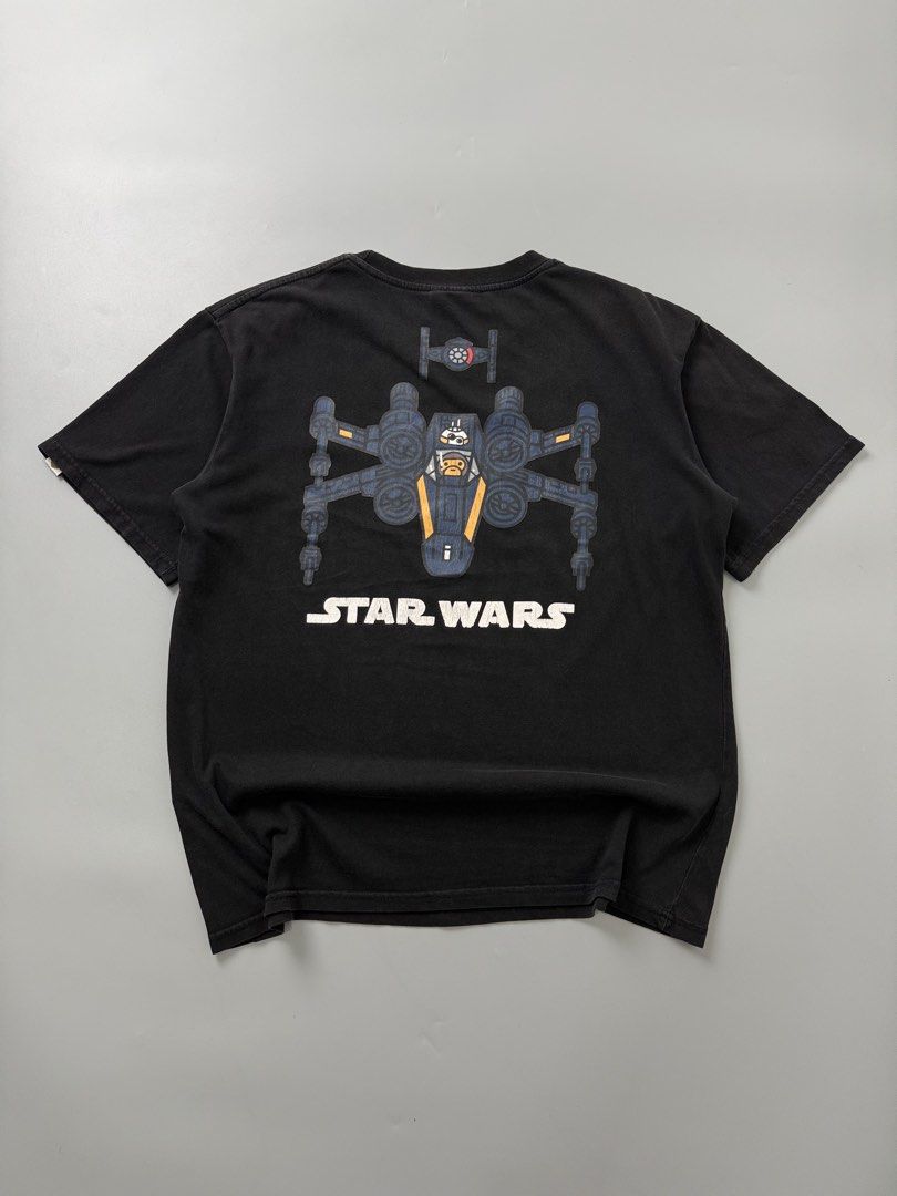 Bape x star wars (Category: Tshirts & Polo Shirts ) located in Pila. Submitted by villanueva80826 (Listing ID 1469525350, Image 1). Description: Bape x star wars Size:small •Width:21 •Length:25.5 •Condition:9/10 •Color rate:9/10 Mine:380 +Shipping fee Issue:sign of usage like hairline crack Still in good for psg condition Still wearable .