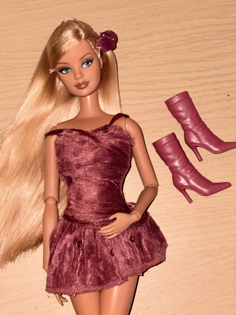 Barbie hair highlights doll (Category: Kids Toys) located in Caloocan City. Submitted by starkiboi (Listing ID 1469494823, Image 3). Description: FOR SALE Barbie hair highlights ₱2,900 -Articulated body -rerooted in saran hair -including dress, hair clip, and boots.