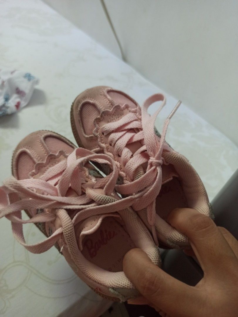 Barbie Pink Toddler Sneakers (Category: Babies & Kids Fashion) located in Manila. Submitted by loloeve12117993 (Listing ID 1469408924, Image 3). Description: - Adorable pink Barbie sneakers with matching laces - Classic casual design with signature Barbie branding on the side and inner sole - Cute tiny heart graphic near the heel - Durable brown rubber soles with grippy texture for active kids - Perfect for daily wear and little ones on the move.