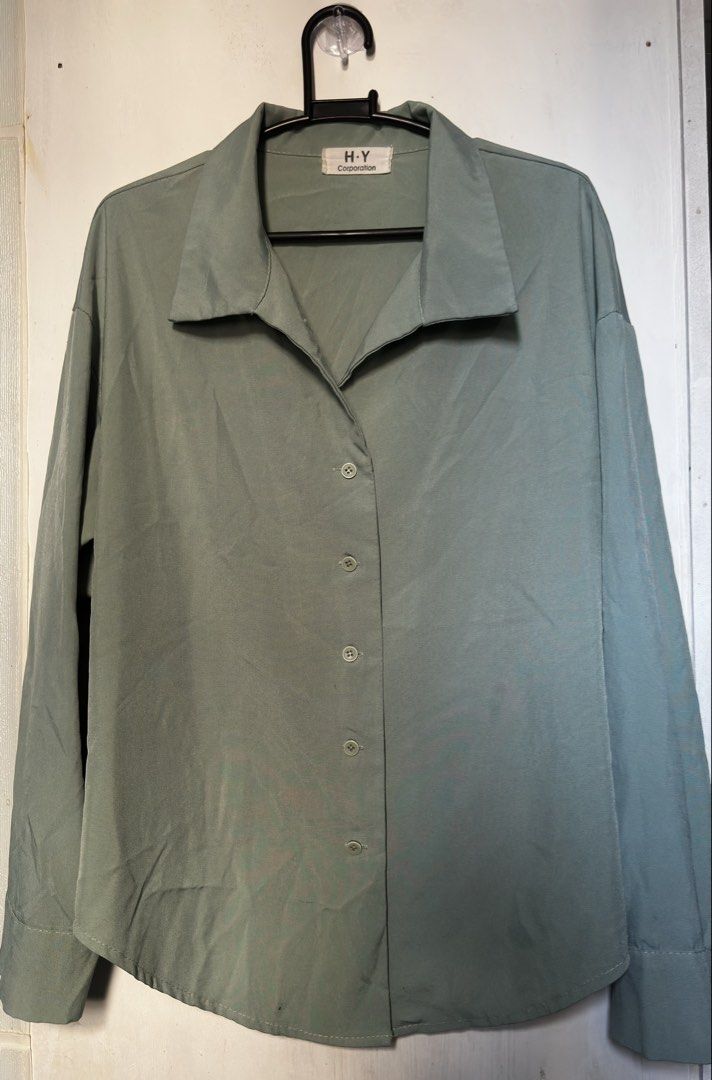 Basic long sleeve sage green button down (Category: Longsleeves) located in Cavite. Submitted by chicfinds.slay (Listing ID 1469494596, Image 1). Description: ✨ basic buttondown longsleeve ✨easy to pair ✨best fit m-semi large body frame women ✨super classy good for formal events/corporates or casual events ✨need to iron and quick wash lang nastock na kasi sa closet .