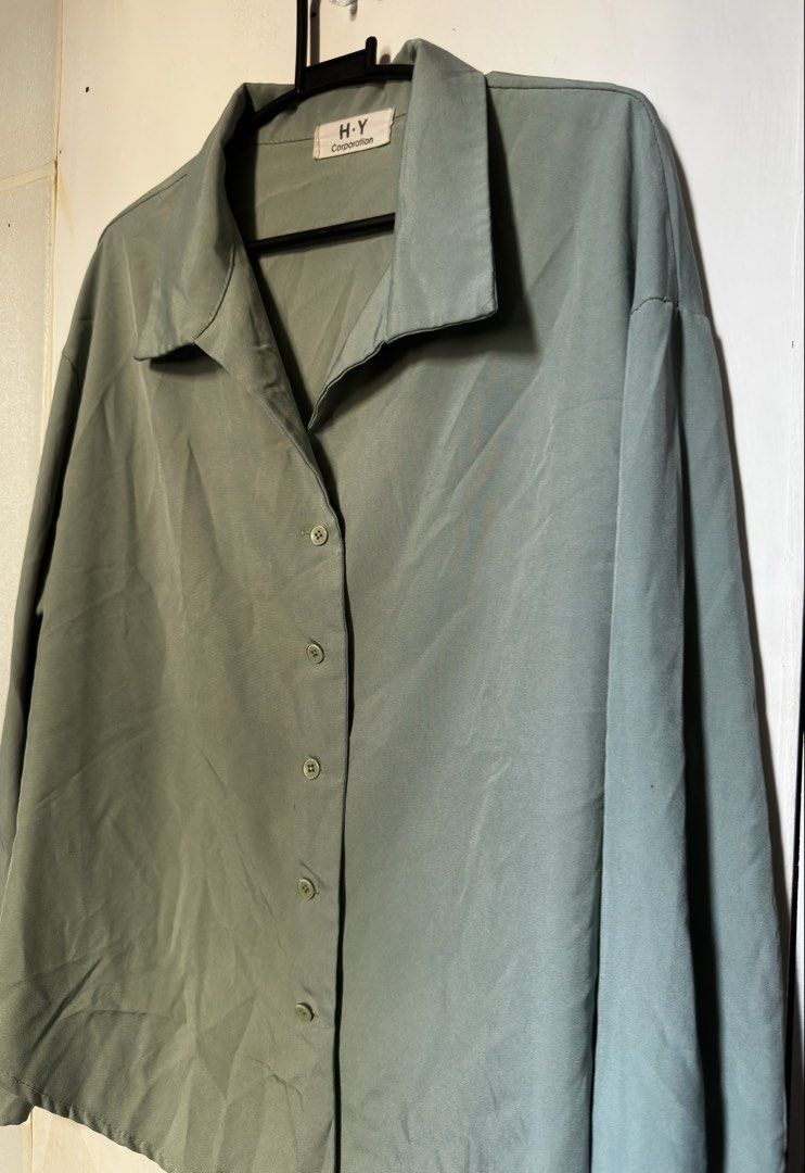 Basic long sleeve sage green button down (Category: Longsleeves) located in Cavite. Submitted by chicfinds.slay (Listing ID 1469494596, Image 2). Description: ✨ basic buttondown longsleeve ✨easy to pair ✨best fit m-semi large body frame women ✨super classy good for formal events/corporates or casual events ✨need to iron and quick wash lang nastock na kasi sa closet .