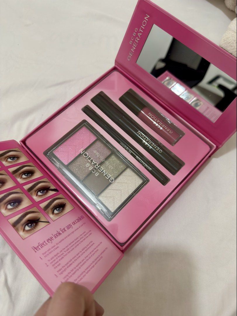 BCBG Generation Essential Face Set Makeup Kit (Category: Makeup) located in Bacoor. Submitted by shop.closetcleanup (Listing ID 1469533748, Image 2). Description: - Brand: BCBG Generation - Condition: Brand new, no longer sealed but original packaging intact - Includes: Face & eye palette, felt tip eyeliner, volumizing mascara, and plumping lip color - Features: Cute pink box with a built-in mirror - Perfect for: Creating effortless everyday look