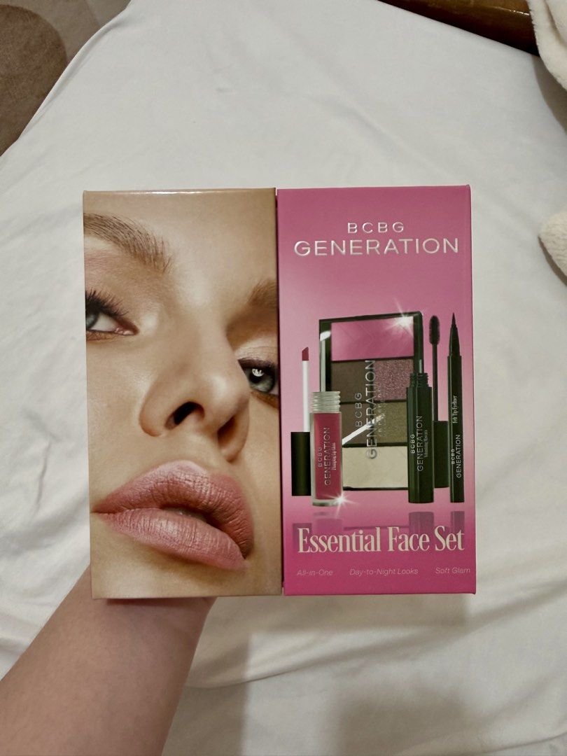 BCBG Generation Essential Face Set Makeup Kit (Category: Makeup) located in Bacoor. Submitted by shop.closetcleanup (Listing ID 1469533748, Image 1). Description: - Brand: BCBG Generation - Condition: Brand new, no longer sealed but original packaging intact - Includes: Face & eye palette, felt tip eyeliner, volumizing mascara, and plumping lip color - Features: Cute pink box with a built-in mirror - Perfect for: Creating effortless everyday look