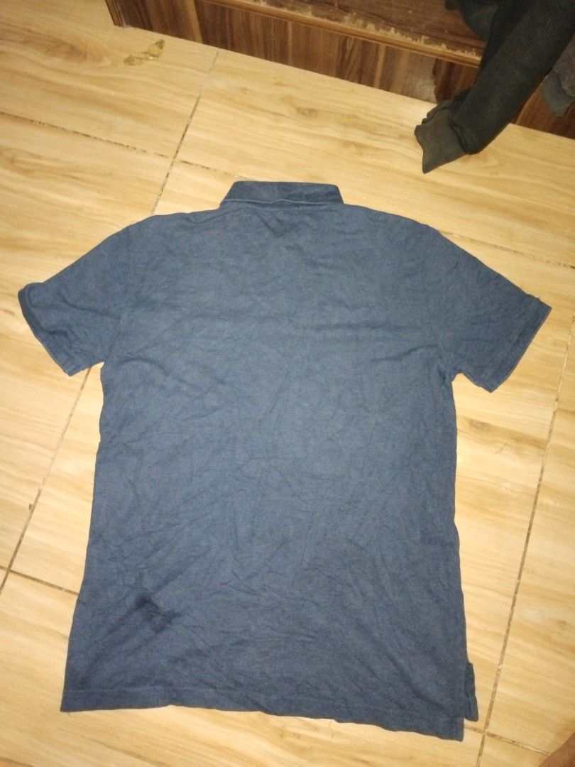 Beanpole Blue Polo Shirt Size 95 (Category: Tshirts & Polo Shirts ) located in Caloocan City. Submitted by mysticdeer_4b2e50 (Listing ID 1469572567, Image 2). Description: - Brand: Beanpole - Color: Blue - Size: 95 (Tag) - Material: 100% Cotton - Origin: Made in Vietnam - Design: Short sleeves, collar neck with 2 buttons, and iconic cyclist chest embroidery - Condition: Excellent / Pre-loved - Mode of Payment: Gcash / Bank Transfer - Shipping: Vi