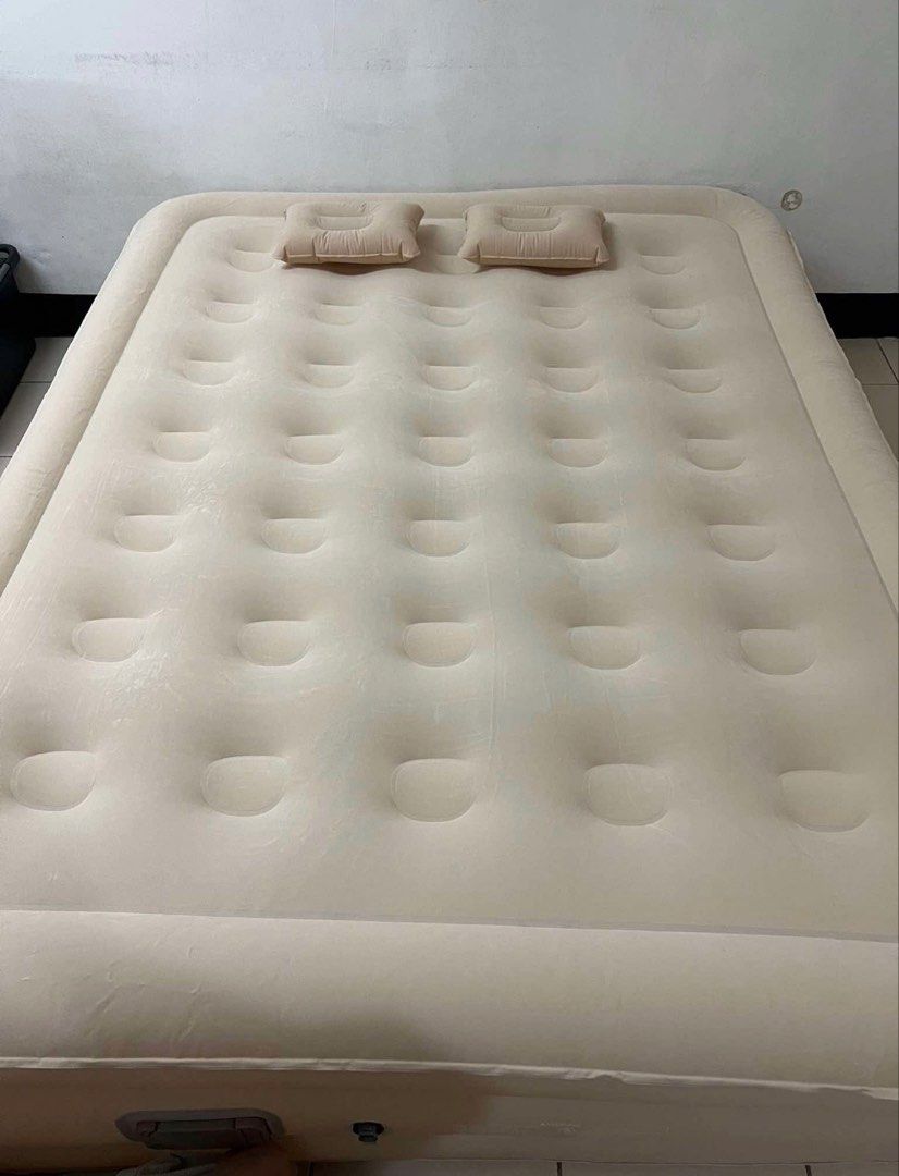Beige Inflatable Air Bed with Two Pillows (Category: Bedding & Towels) located in Quezon City. Submitted by msuyo (Listing ID 1469452897, Image 1). Description: - self inflating/ deflating - queen size - Color: Beige - Surface: Soft flocked velvety texture for extra comfort - Includes: 2 matching small inflatable pillows - Valve: Built-in near the base for quick and easy inflation/deflation - Design: Raised border around the edges to keep bedding