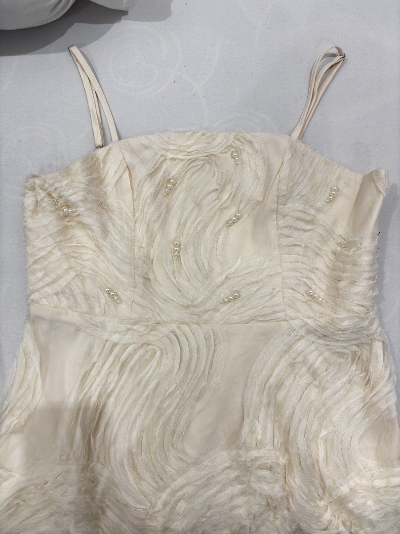 Beige Long Dress (Category: Dresses) located in Manila. Submitted by niellaeun (Listing ID 1469434976, Image 2). Description: Original Price: 1,600 Size: XL on tag Waist: 33-34 Bust: 38 Good for graduation dress or oath taking Excellent Condition (no flaws once lang nagamit) Below the knee yung haba.