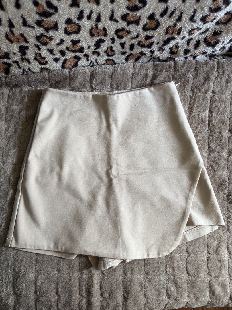 Beige Skort Size S (Category: Skirts) located in Quezon City. Submitted by 7th.avenue_closet (Listing ID 1469502150, Image 1). Description: - Skort - Size: Small, 25-26 waistline - Color: Beige/cream - Closure: Side zipper, with 1 side pocket - Condition: Good as new, used only twice - Shipping fee c/o the buyer - Bought in Thailand.