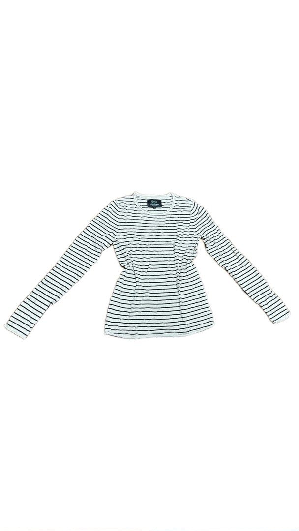 Beige Striped Long Sleeve Top (Category: Longsleeves) located in Manila. Submitted by yumidrobeee (Listing ID 1469500537, Image 1). Description: - Brand: Ellandem - Design: Classic black and beige horizontal stripes with a crew neckline - Material: Soft fabric for an ultra-comfortable fit - Versatility: Easy to match with denim jeans or skirts - Fit: Standard women's sizing, perfect for everyday casual wear.