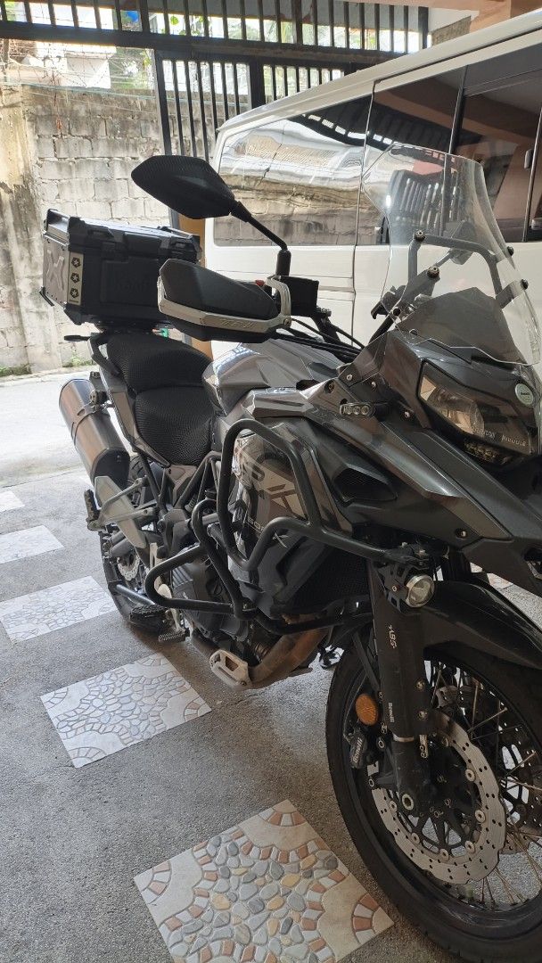 Benelli TRK 502X Motorcycle Gray with Top Box (Category: Motorbikes for Sale) located in Manila. Submitted by whatyouwantiswhatwehave. (Listing ID 1469399851, Image 1). Description: Benelli TRK 502X adventure motorcycle in gray. 2023 model. Includes rear top box, crash bars, auxiliary lights, and handguards. Spoke wheels, large windscreen, and rear mudguard attached. Registered under private classification. LTO documents complete. Well maintained
