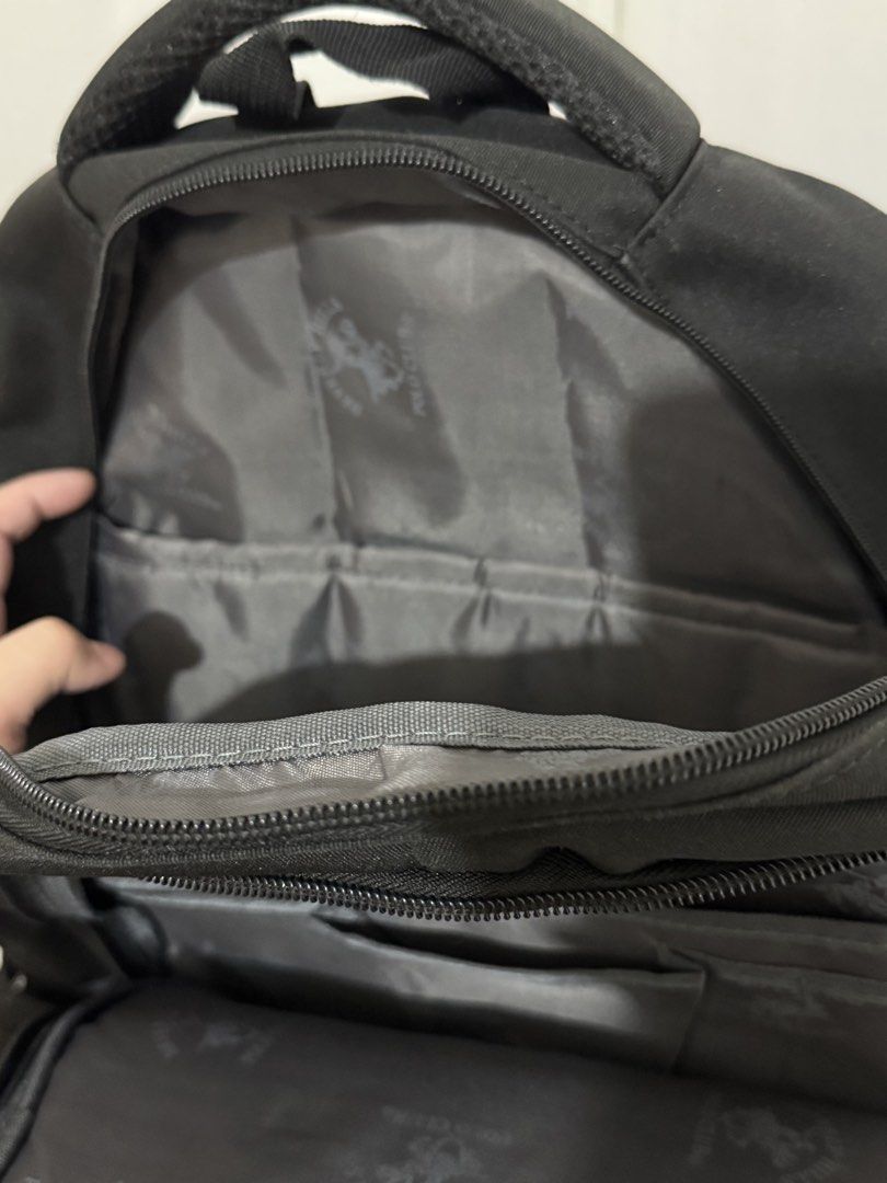 Beverly Hills Polo Club Black Backpack (Category: Backpacks) located in Paranaque City. Submitted by shopdecalidad (Listing ID 1469438648, Image 3). Description: - Brand: Beverly Hills Polo Club - Color: Classic Black - Multiple secure zippered compartments and interior organizer slots - Breathable mesh padding on the back and shoulder straps for all-day comfort - Convenient side mesh pockets for water bottles - Durable top handle and solid, stur