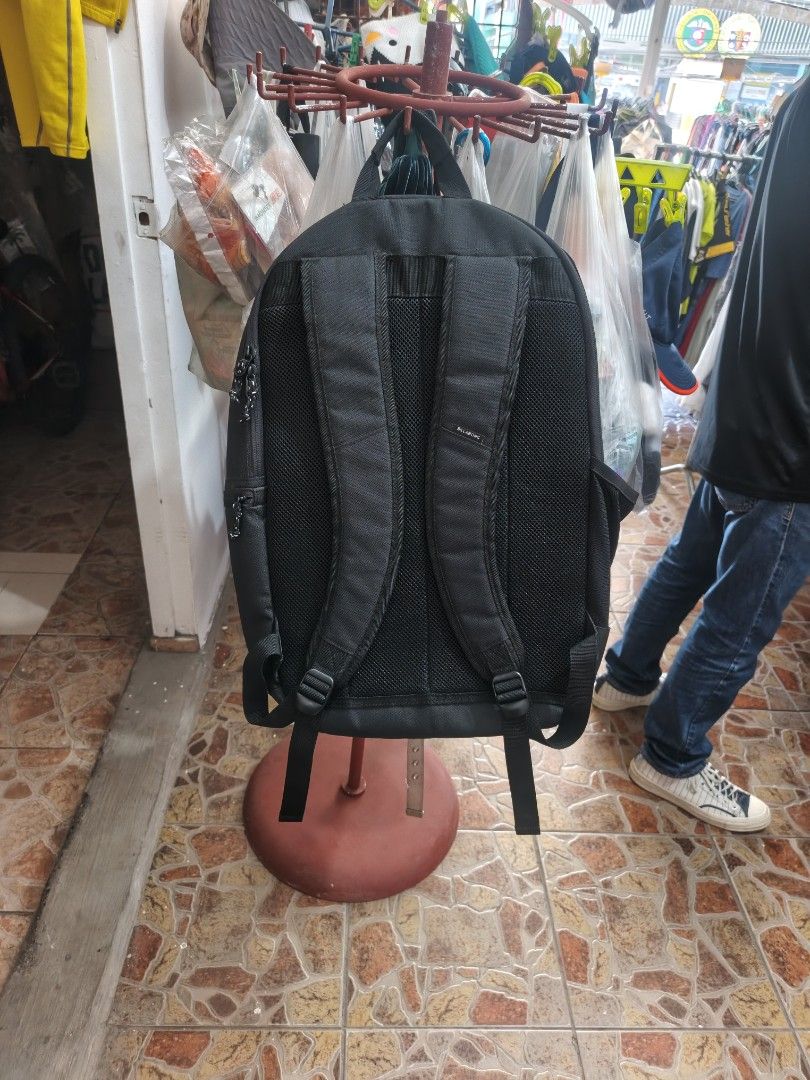 Billabong Black Yellow Teal Gradient Backpack (Category: Backpacks) located in Bayombong. Submitted by onlygoodfinds. (Listing ID 1469409616, Image 2). Description: - Brand: Billabong - Colorway: Black, yellow, and teal gradient - Comfort: Mesh back padding and adjustable shoulder straps with branded tag - Storage: Spacious main compartment for books/gear plus front zipped compartment with branded patch and pulls - Condition: Durable fabric that 