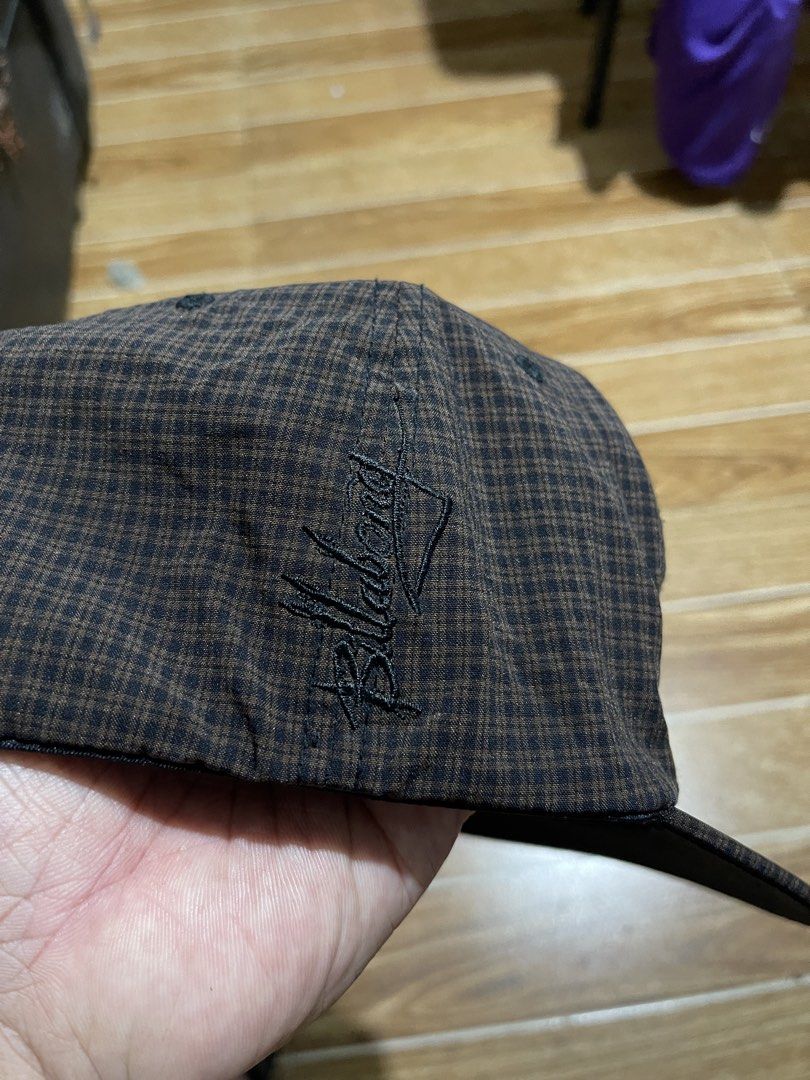 Billabong Flexfit Brown Houndstooth Cap (Category: Caps & Hats) located in Mandaluyong City. Submitted by mark2pac (Listing ID 1469534905, Image 2). Description: - Brand: Billabong - Design: Brown houndstooth pattern with structured panels - Details: Distinctive wave logo embroidery on the side - Fit: Flexfit inner band for a comfortable stretch fit - Condition: Clean interior lining with standard brand tags intact.