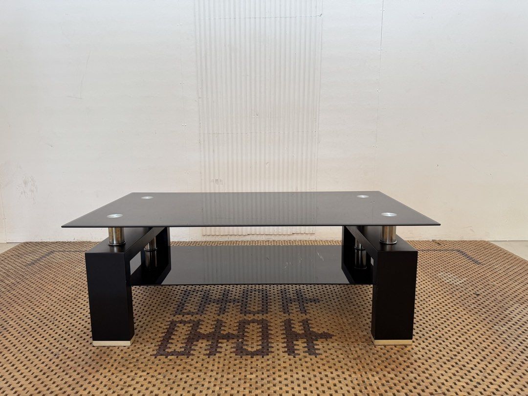 Black center table (Category: Tables & Sets) located in Quezon City. Submitted by matetdevis13 (Listing ID 1469537089, Image 1). Description: Black Glass Center Table Price: 4,500 L47.5 x W25.5 x H17 In good condition Code JMD12-M25.