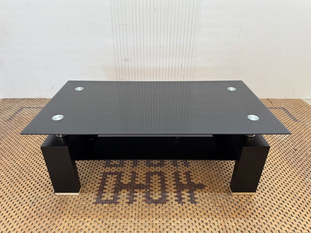Black center table (Category: Tables & Sets) located in Quezon City. Submitted by matetdevis13 (Listing ID 1469537089, Image 2). Description: Black Glass Center Table Price: 4,500 L47.5 x W25.5 x H17 In good condition Code JMD12-M25.