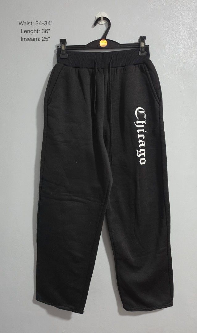 Black Chicago Graphic Sweatpants Joggers (Category: Jeans) located in Paranaque City. Submitted by franinnashop (Listing ID 1469459101, Image 1). Description: Declutter - Style: Casual streetwear black sweatpants with white Chicago gothic text on the left leg - Comfort: Soft fleece fabric inside, perfect for everyday wear - Features: Thick elastic waistband with adjustable drawstring cords and deep side pockets - Measurements: Waist 24 to 34 inch
