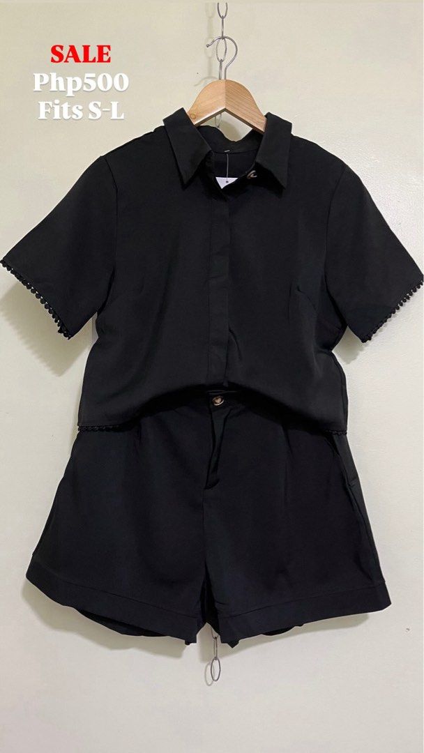 Black Collared Shirt and Shorts Matching Set (Category: Sets or Coordinates) located in Manila. Submitted by krizasucga40217 (Listing ID 1469476101, Image 1). Description: - Color: Black - Set includes: Short-sleeved collared button-down top and matching shorts - Details: Cute pom-pom trim on short sleeves and shirt hem, with button closures - Fit: Free size (fits Small to Large) - Style: Great for casual days out or lounging at home, and easy to