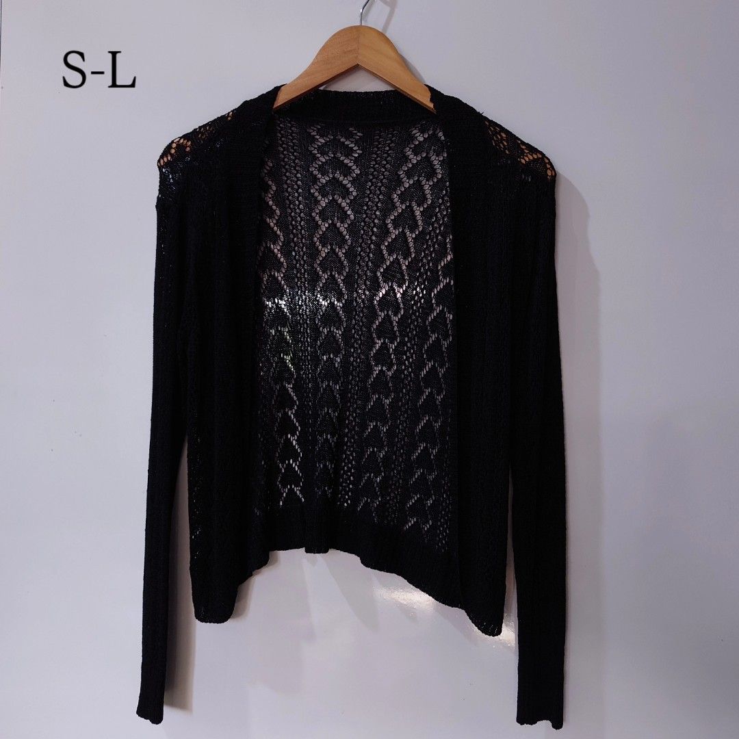 Black Crochet Knit Open Front Cardigan (Category: Coats, Jackets and Outerwear) located in Diffun. Submitted by declutteredbyJill (Listing ID 1469570849, Image 1). Description: - Color: Black - Style: Open front with long sleeves - Design: Detailed crochet knit pattern on the back and shoulders - Fabric: Lightweight, ideal for layering over tops and dresses - Size: Free size, fits Small to Large comfortably.