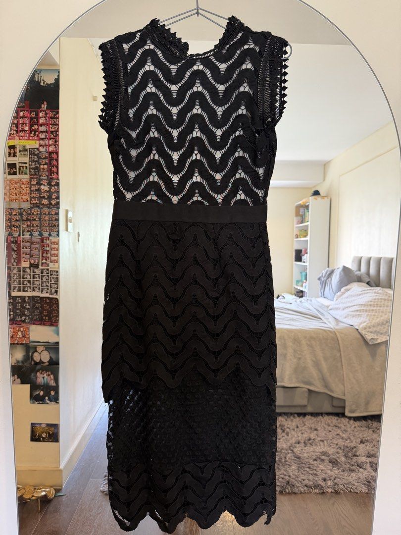 Black Lace Cutout Midi Dress (Category: Dresses) located in Quezon City. Submitted by lililiadluns (Listing ID 1469437873, Image 1). Description: - Style: Black lace midi dress with wave patterns and sheer mesh panels - Details: High neckline, cap sleeves, and a stylish exposed gold back zipper - Texture: Mixed lace textures on the skirt overlay - Size: Fits a regular Medium - Condition: Never worn, No tags - For formal nights.