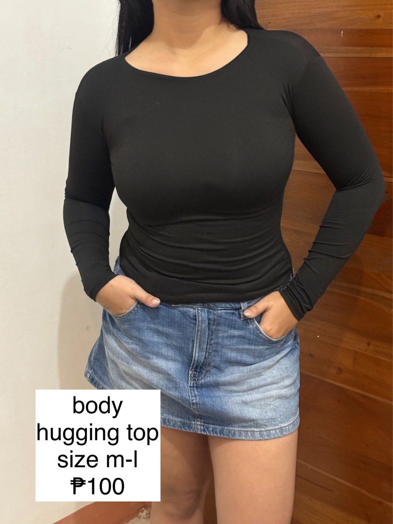 Black Long Sleeved Body Hugging Top (Category: Longsleeves) located in Manila. Submitted by sstash444 (Listing ID 1469411143, Image 1). Description: - Color: Black - Style: Long-sleeved, body-hugging fit with a scoop neckline - Size: Fits Medium to Large - Material: Comfortable stretch fabric, easy to match with skirts or jeans.