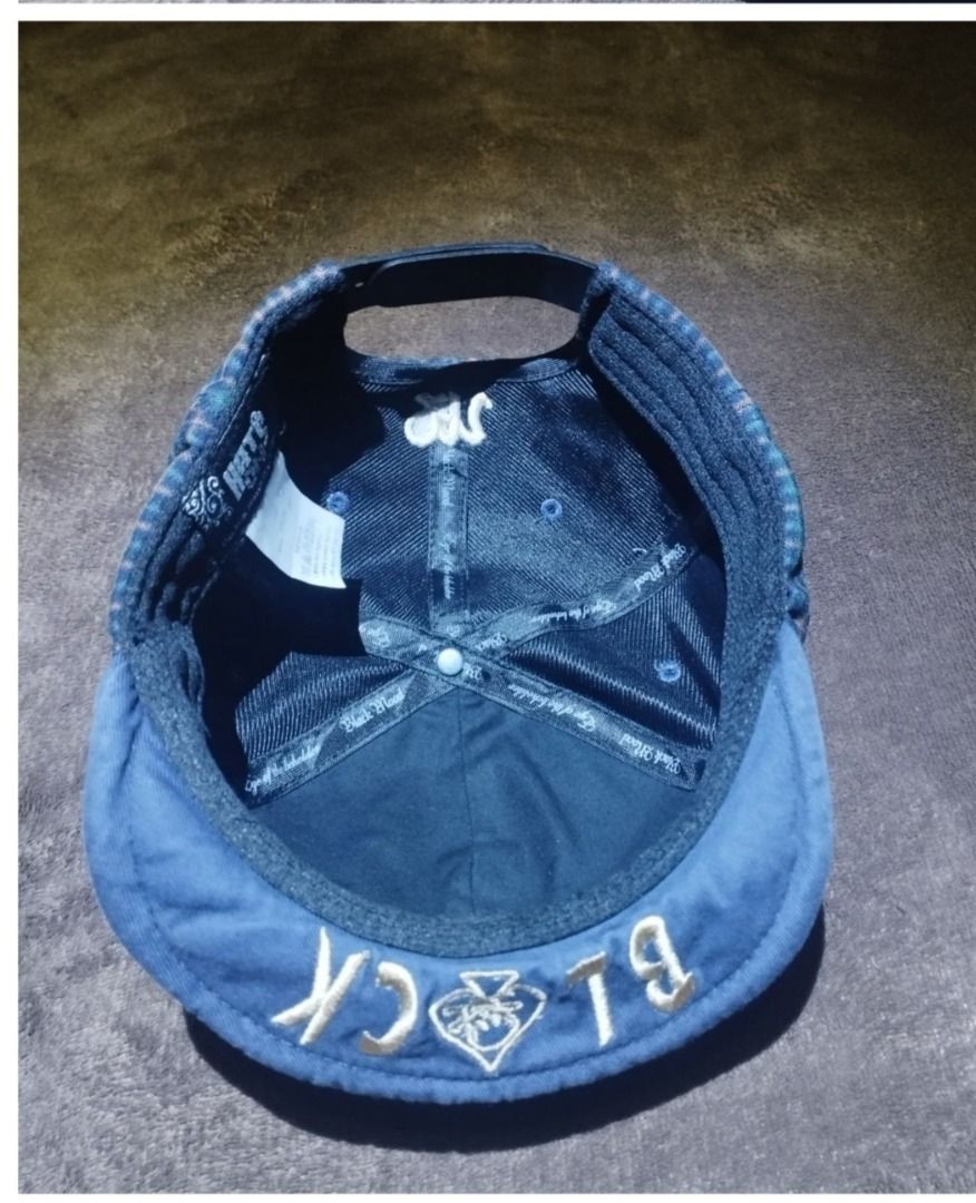 Black Mood Plaid Snapback Cap with Embroidery (Category: Caps & Hats) located in Caloocan City. Submitted by jrdar (Listing ID 1469571104, Image 3). Description: - Color: Blue and green plaid - Details: 'Black Mood' vertical text on side, embroidered text and spade skull graphic under the brim - Fit: Adjustable plastic strap at the back - Underbrim: Dark blue - Interior: Clean lining with branded taping - Style: Great casual streetwear accessory.