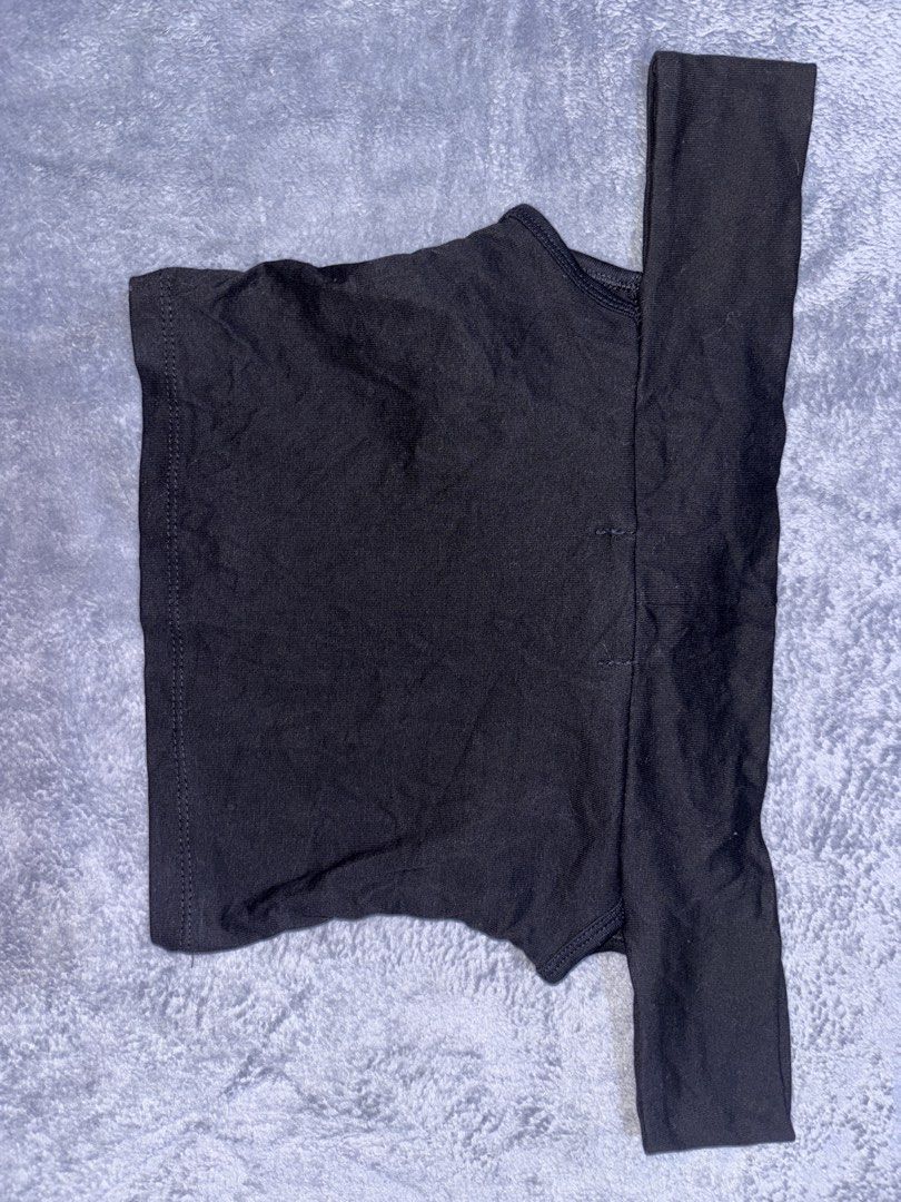 Black off-shoulder crop top (Category: Sleeveless) located in San Pedro. Submitted by classychic.couture (Listing ID 1469538786, Image 3). Description: - Small - Medium (suitable for broad shoulders) - Two-way top (off shoulder and tank top) - Good as new with tag - No issues.